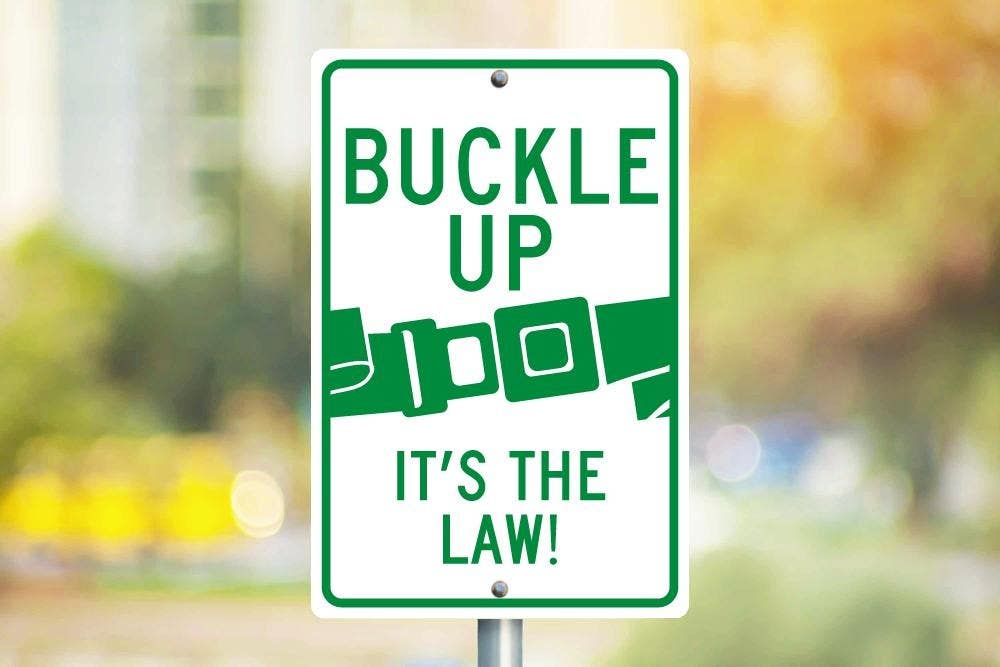 AccuformNMC TM135J Buckle Up, It's The Law Sign, .080 Reflective Aluminum, 18" x 12"