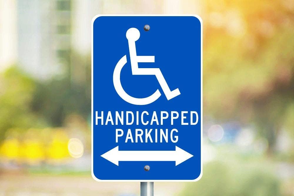 AccuformNMC FRA226RA Handicapped Parking w/ Double Arrow Sign (Graphic), .080 EGP Reflective Aluminum, 18" x 12"