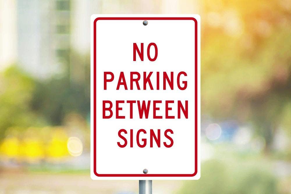 AccuformNMC TM29 No Parking Between Signs, 18" x 12"