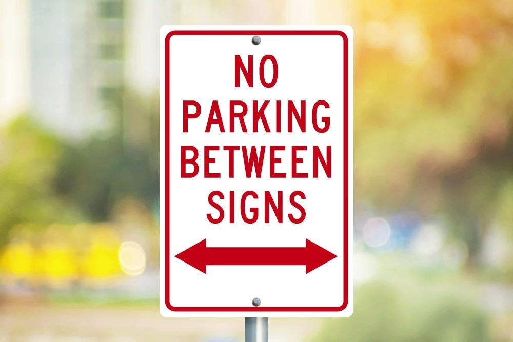 AccuformNMC TM32H No Parking Between Signs w/ Double Arrow, .063 Aluminum, 18" x 12"