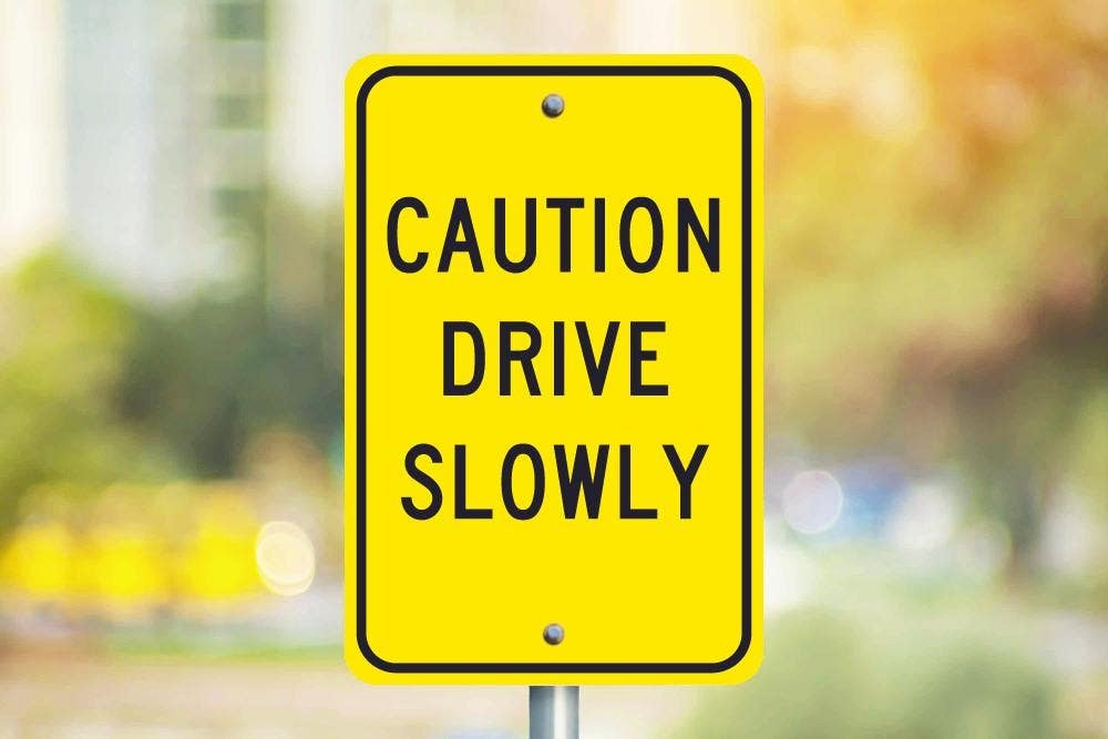 AccuformNMC TM72 Caution Drive Slowly Sign, 18" x 12"