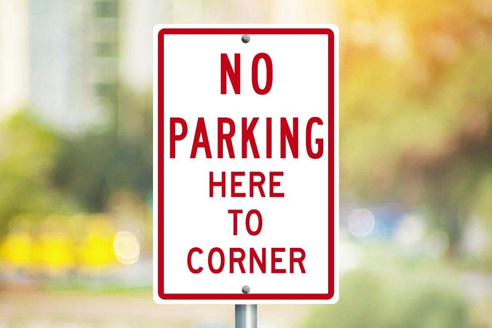 AccuformNMC TM99 No Parking Here To Corner Sign, 18" x 12"