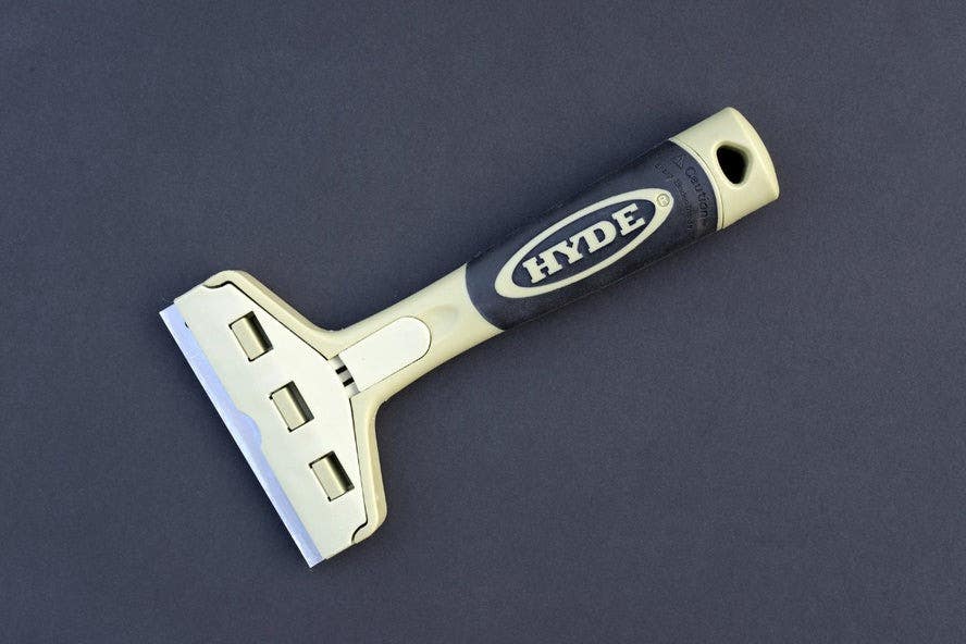 Hyde Tools 33250 Glass and Wall Scraper with Blade Storage 4"