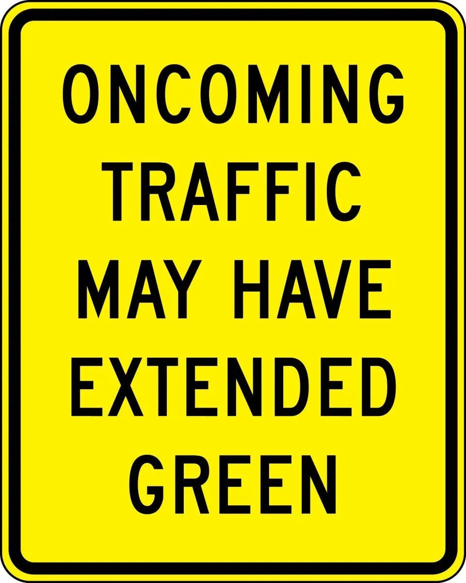 AccuformNMC FRW770 Intersection Sign, Oncoming Traffic May Have Extended Green, 30" H x 24" W