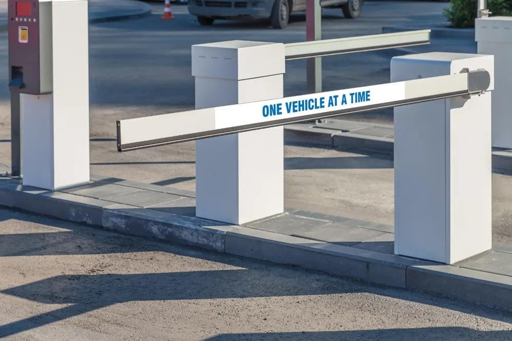 AccuformNMC LVHR Gate Arm Sign, One Vehicle At A Time